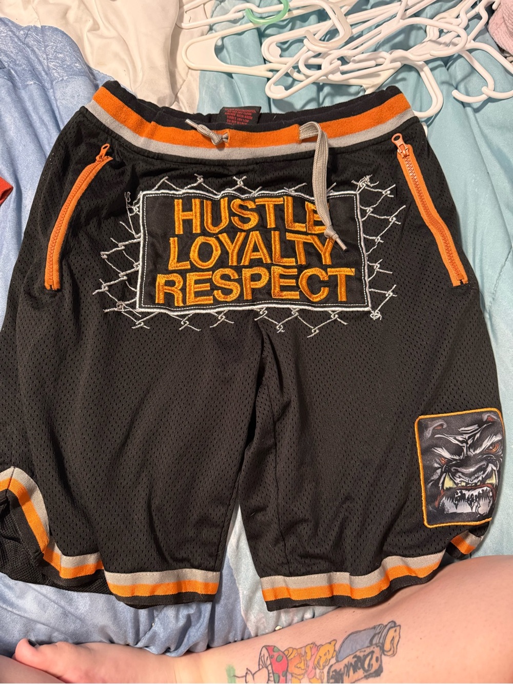 WWE Black Athletic Shorts with Orange Trim - Hustle Loyalty Respect